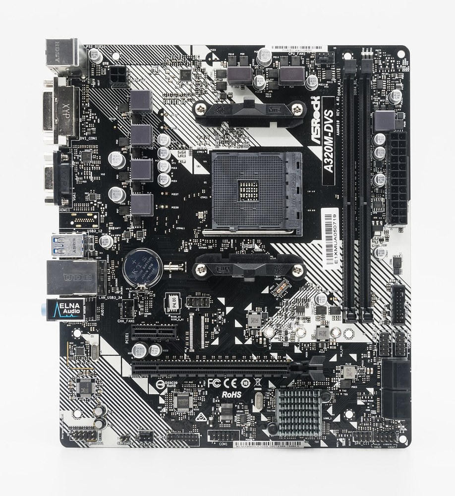 A computer motherboard with sockets and expansion slots